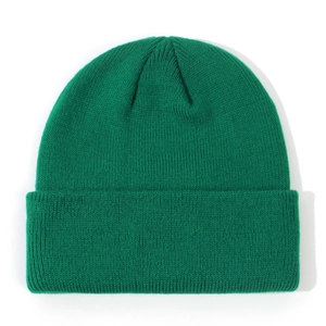 Detailed view of dark green ribbed knit beanie for infants with elastic cuff