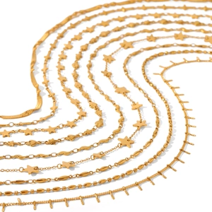 Classic gold layered stainless steel necklaces with star and heart pendants on white background