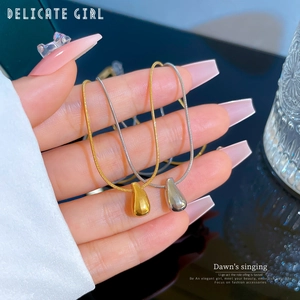 Water drop necklaces in gold and silver finish with delicate snake chains