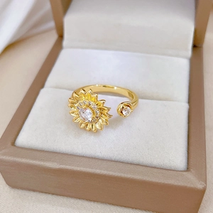 Sunflower gold plated open ring with white cubic zirconia in a velvet gift box