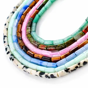 Macro view of various 3mm natural gemstone beads in multiple colors for DIY jewelry making