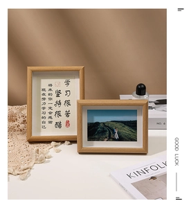 Detail of natural wood frames with visible grain in a cozy minimalist home decor setting