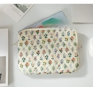Floral quilted laptop sleeve with double zipper and padded cotton for tablet protection