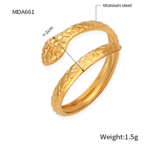 Macro shot of gold plated snake ring showing 1cm head width and 1.5g titanium steel build