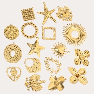 Golden titanium steel DIY charms in various shapes like star, heart and clover