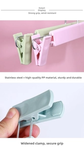 Detailed macro view of non-slip PP plastic clips with wide jaw and stainless steel spring