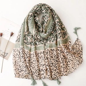 Leopard print cotton linen scarf with LOVE lettering and decorative tassels for women