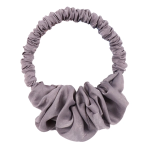 Detailed view of grey satin fabric bun maker scrunchie with smooth silk texture