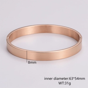 Detailed view of rose gold bangle with 8mm width and internal dimension specs