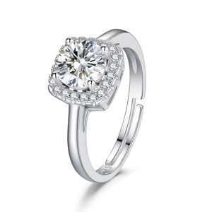 Close-up of S925 sterling silver ring featuring a four-prong set round moissanite