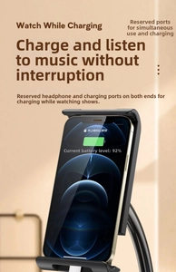 Detailed view of black phone stand showing bottom slots for charging and headphone cables