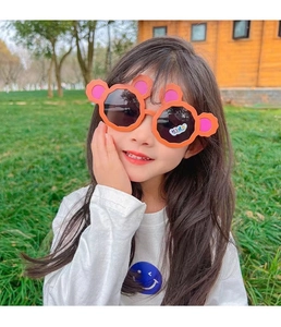 Cute toddler sunglasses with cartoon bear ears for effective sun protection outdoors