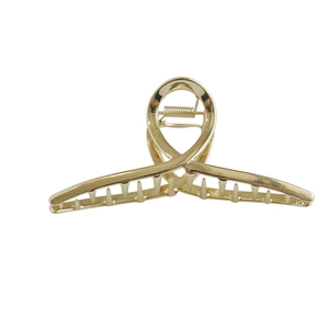 Polished gold metal shark hair claw clip for thick hair with sleek metallic finish