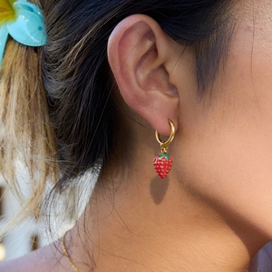 18K gold plated stainless steel hoop earrings with sweet red strawberry charms on model