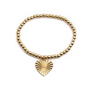 Gold beaded chain bracelet with heart pendant featuring sunburst texture and zircon