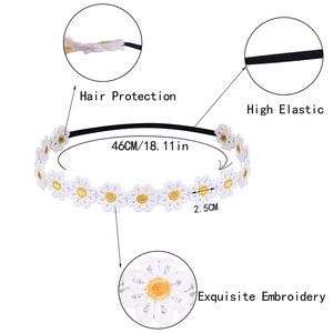 Soft elastic baby headband with white daisy embroidery and hair protection design