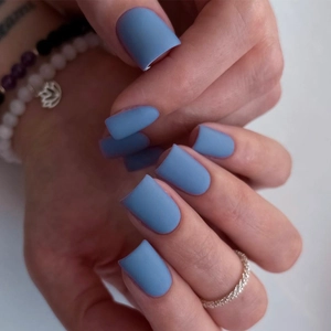 Short matte blue square press-on nails for a clean and elegant minimalist manicure