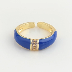 Detail of adjustable gold ring featuring blue enamel and sparkling pavé zircon stones