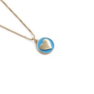 Collana in rame placcato oro con ciondolo geometrico a cuore in smalto blu