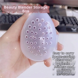 Detailopname van een paarse siliconen make-up spons houder met ventilatieopeningen