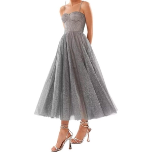 Elegant silver sequin midi prom dress with spaghetti straps and a flared A-line silhouette