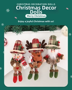 Detailed view of Christmas tree hanging ornaments featuring snowman, reindeer and Santa