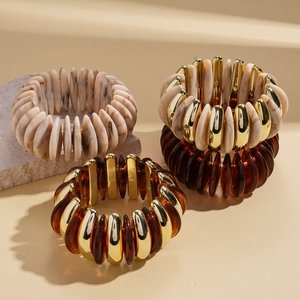 Bohemian acrylic geometric beaded elastic bracelets in amber and marble white tones