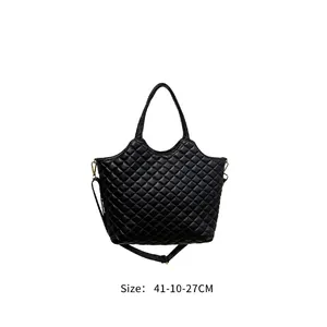 Classic black quilted tote bag with golden hardware and leather handles size 41x10x27cm