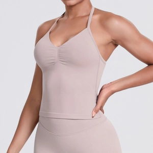 Close-up of seamless knitted light purple yoga top featuring a V-neck and ribbed texture