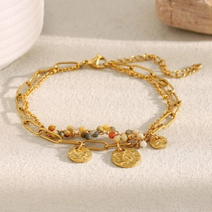 Detail of 18K gold-plated double-layer chain bracelet with coin pendant and beads