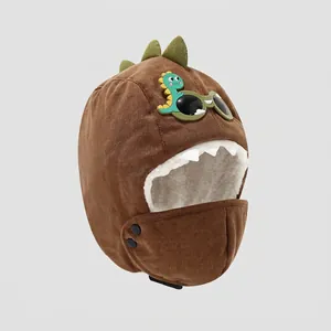 Detail of brown corduroy kids dinosaur hat with warm white fleece lining and eye protection