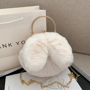 Cute beige plush handbag with rabbit ears and golden chain strap for women