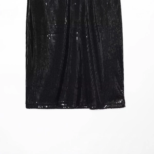 Chic black sequin halter neck dress featuring high-quality shimmering fabric detail