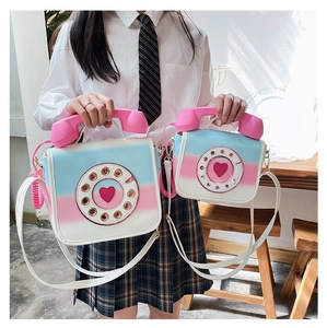 Creative retro telephone shaped gradient crossbody bags shown in two sizes for women