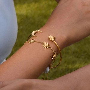 Bracelet jonc classique en acier inoxydable plaqué or 18 carats motifs soleil et lune