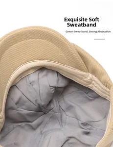 Detailed close-up of the cotton sweatband inside a wool blend baker boy newsboy cap
