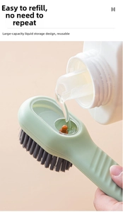 Detailed view of pouring cleaning liquid into the shoe brush reservoir