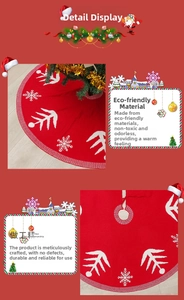 Detail of red knit Christmas tree skirt with white snowflake and pine needle patterns