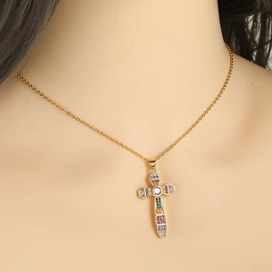 Cross necklace with gold plating and colorful zircons worn on model neck