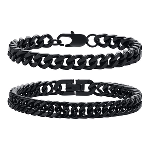 Detail of two black cuban link bracelets for men with lobster and folding clasps