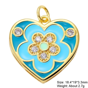 Detail of blue enamel heart pendant with flower zircon inlay and size dimensions
