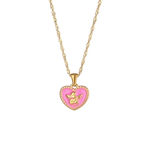 Detail view of pink heart pendant with golden angel relief on a gold rope chain