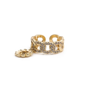 Golden chain link ring featuring a daisy pendant and shimmering clear zircon stones