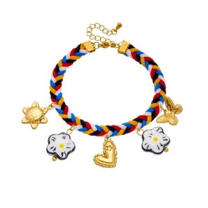 Colorful hand-woven cord bracelet with gold heart and ceramic flower pendants
