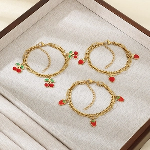 Double-layered 18K gold plated stainless steel anklet with red strawberry and cherry charms