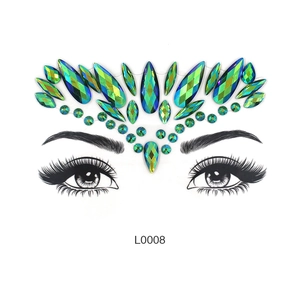 Blue-green crystal face jewels stickers set with decorative glitter gems on forehead