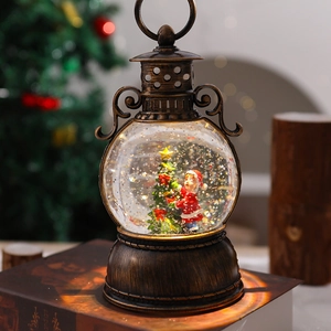 Close-up of bronze vintage Christmas lantern featuring Santa Claus and snow globe lighting