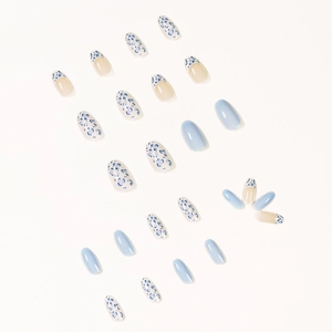 Short ballet press-on nail set in creamy white and baby blue floral patterns