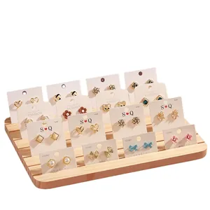 Solid wood jewelry display stand with varied 925 silver stud earrings set