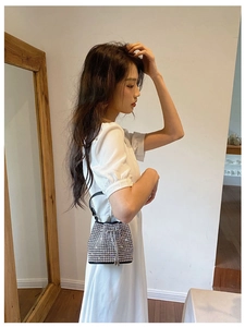 Sparkling rhinestone bucket bag with drawstring closure and fringe details for women